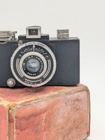 Load image into Gallery viewer, Appareil Photo – SEM Kim (v. 1950)